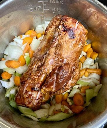 Added the veg and smoked ham shank, then Instant Potted for 20 minutes. 