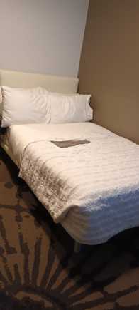 Two people fit in the bed, but it is tight
