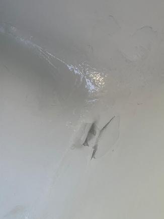 The bath tube was literally falling apart (peeling)