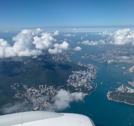 Rare East arrival at HKIA. On the left, Hong Kong Island. On the right, Kowloon. The straight strip of land on the right is the location of the former Kai Tak airport