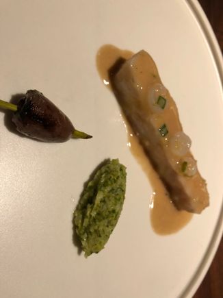 Sturgeon in chicken cream, cabbage salad, and chicken heart