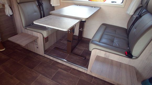 Some models have very narrow space between the seats and table. This one had plenty of legroom and additional extension for table and foldable seats