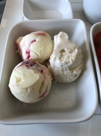 Ice cream: two scoops of strawberry cheesecake and one scoop of vanilla