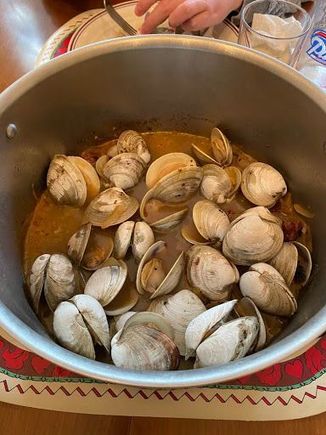 cooked with linguica, onions, white wine, and the clam broth from the last batch (strained).