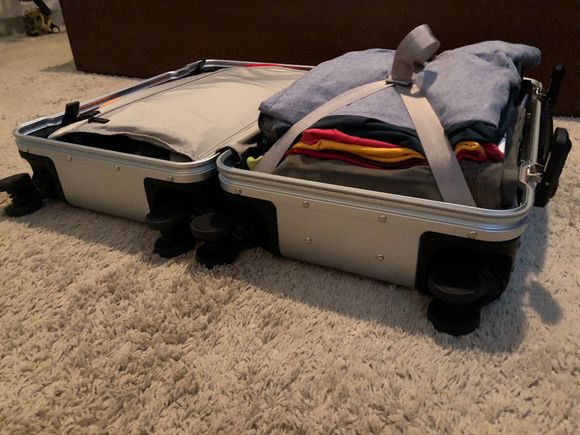 Arlo Skye bag. The X straps don’t give you much squish to pack down clothes. I was somehow still able to close this with a lot of force but it bulged both the AL and plastic bags outward. Also the latches were a little hard to open when packed this much.
