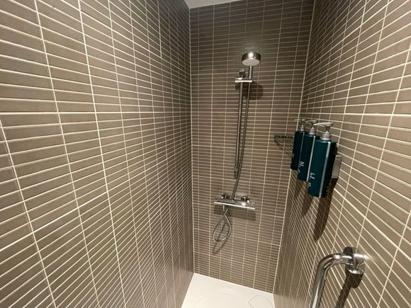 Pump toiletries and low shower