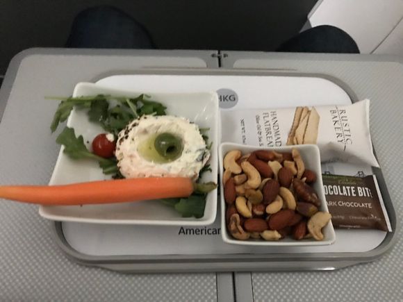 ORD-DCA - 3:15PM (737)

Light bites, choice between cheese plate and tomato/basil dip. Went with the dip, since I did cheese on the last flight. 

Ended up being quite good. This is an area where AA really beats DL. 