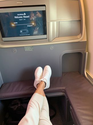 I'm 5'4" - if you are taller, thats the cubby on the right where your feet go.