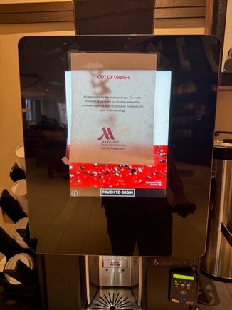 Broken coffee machine in the lobby