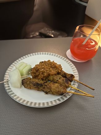 Satay and a Singapore Sling. pre-dinner on SIN-LAX