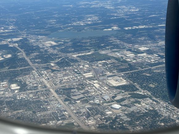 Jerry World, the current and former homes of the Texas Rangers, Six Flags over Texas, and more of the Metroplex visible as we turn for the downwind into DFW. 