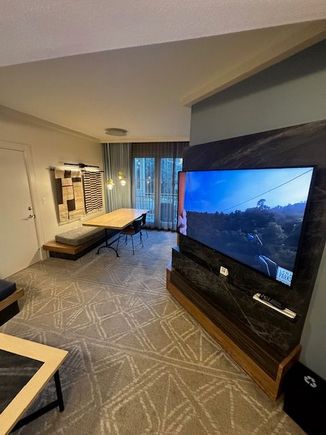 Junior suite TV and dining table