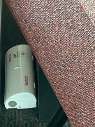These are located behind almost many  seats. Once you see them you can’t un see them