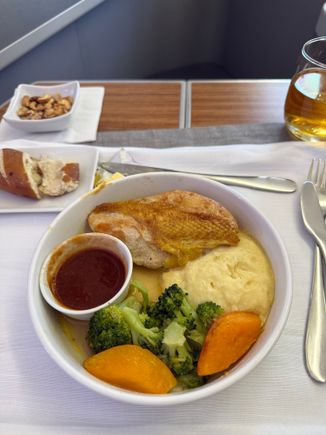 My luck continued with getting the last Corn Fed Chicken Breast with cauliflower mash, roasted broccoli with rosemary tomato sauce (so many had pre-ordered this), which was delicious. It was the juiciest chicken I've ever had on a plane.