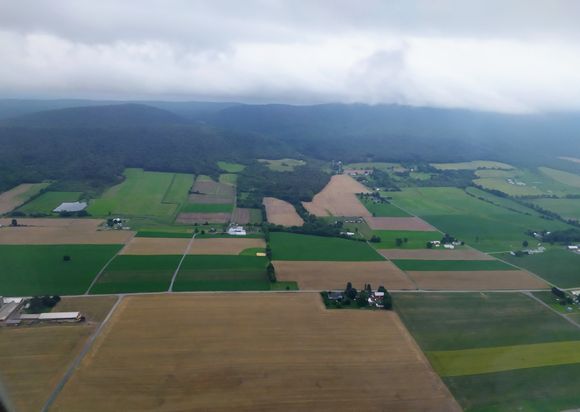 The countryside around Altoona and Martinsburg is quite agricultural with forested mountains in the background 