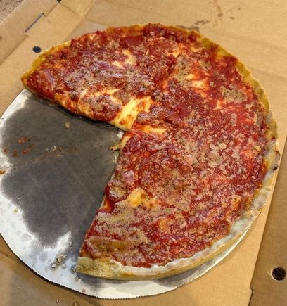 Ordered a medium pizza from Lou Malnati’s. Received a large. Oh well 