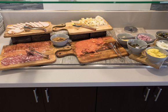 Breakfast items, smoked salmon, cold cuts.  M-Club.