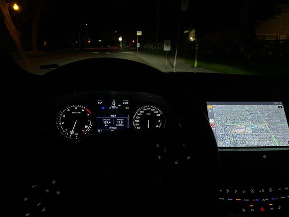 Cabin at night. The instrument cluster looks like it came right out of a Malibu. 
