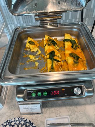 Egg and cheddar omelet with spinach were above average for airport lounge fare