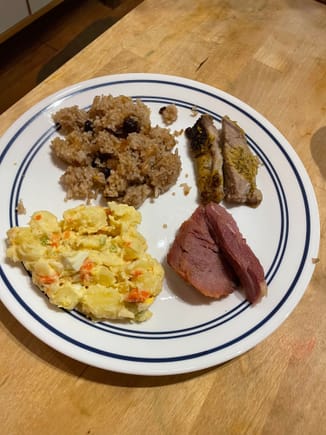 A simple version of a Panamanian Christmas Eve dinner.  

From top left: raisin rice, roast pork, ham, potato salad with apples.  I was feeling ever so slightly hungry and if I reheated them I could post them here.  In hindsight this was a lot of carbs and pork to eat so late at night.  