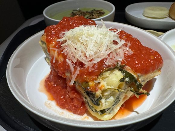 Lasagna - spinach, kale, pomodoro sauce, parmigiano.  Very tasty, excellent with the Calabrian chili oil!