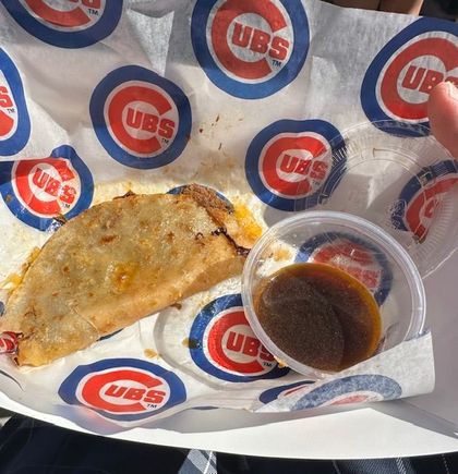 Birria taco with consommé at the ballgame today. I ate two before I remembered to take the pic. Really tasty. 