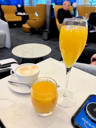 Coffee, OJ, and Bucks Fizz, ordered via the QR code on the table. This system worked well.