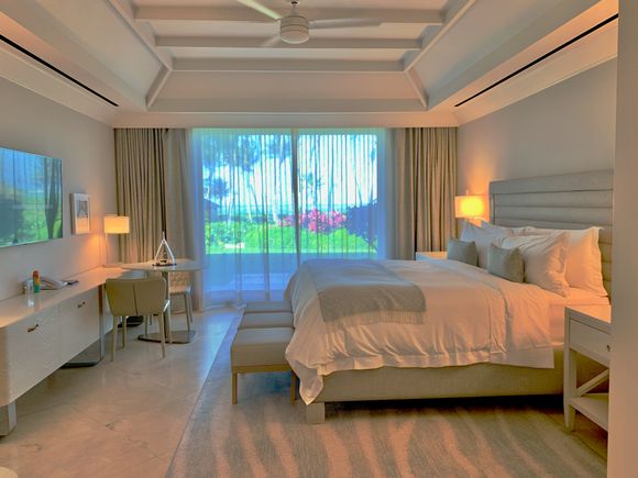 the bedroom of our 1BR Oceanfront Suite