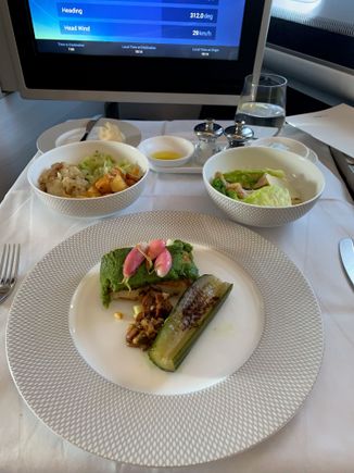 Fillet of halibut with roasted cucumber, girolle mushrooms, salad cream, accompanied by a classic Caesar Salad with sourdough croutons and pickled anchovies