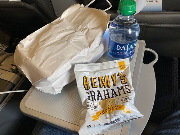 AA Y & F Snack bag to both cabins on boarding (MIA-DFW)