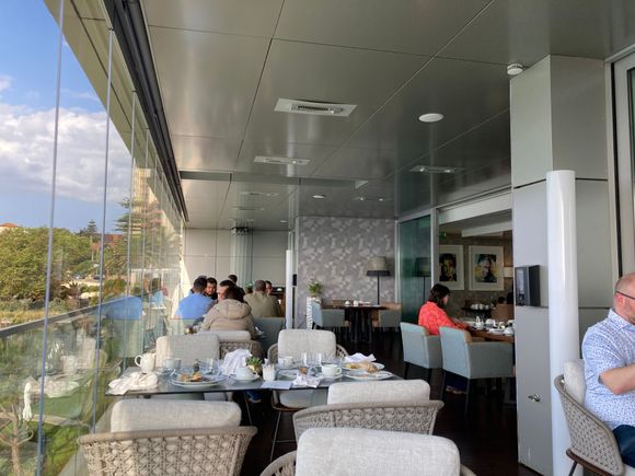 There is seating indoors or on the patio.