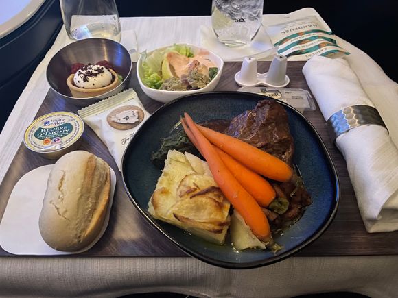 Lunch meal on my recent flight in business. Although all very tasty, the small dishes are the desert and starter! They were absolutely tiny and what happened to serving 3 courses separately