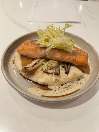 The grilled salmon. Very generous portion. Cooked well and nice complex and balanced flavours across the dish. 