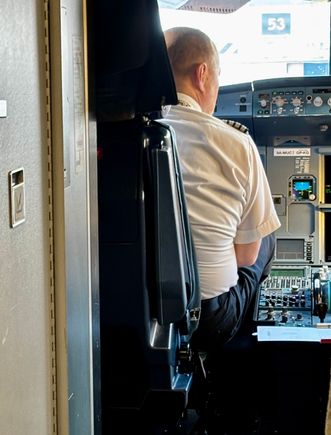 View into the flight deck - our Captain for this flight 