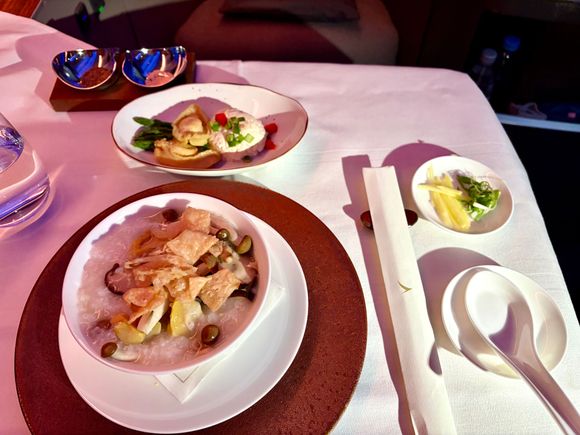 first meal after takeoff - congee and starter 