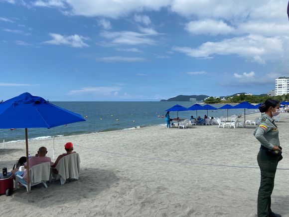 beach security. No hawkers allowed. They can be relentless in Colombia(wont leave for 1 hour even after no) so this is a luxury