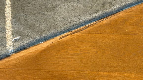Ugly gap between wood planks in the lounge 