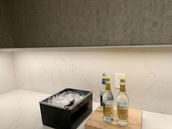 They finally put ice and mixers out! But…without any glassware. 