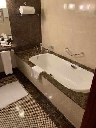 The main bathroom with slower and toilet at the left hand side of the bathroom