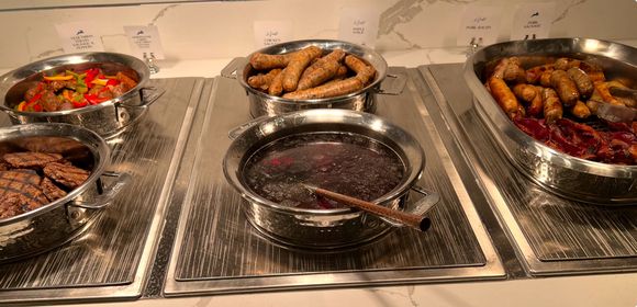 High quality bacon and sausages and some type of meat patties