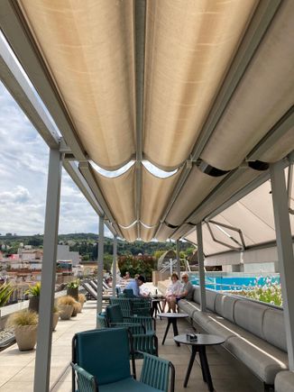 The patio can be made open air or covered to protect against sun & shade ...... note : this is also the designated smoking area: ashtrays are provided 