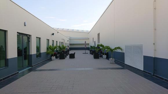 Outdoor area connected to the CIP lounge. 