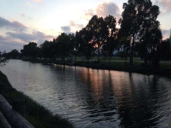 Along the Hayarkon River at sunset, Shabbat