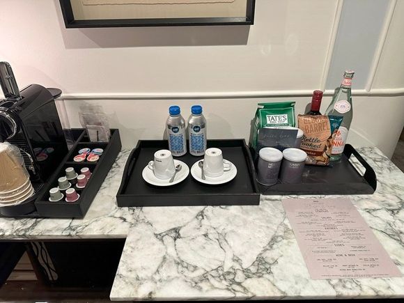 The two aluminum water bottles were not complimentary. However, I was given two plastic bottles of water at check-in.