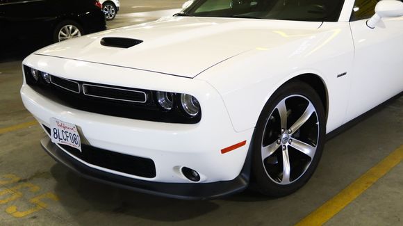 An interesting debadged Challenger R/T if I am not wrong. Challenger logo and R/T logo gone but it has Hemi on both sides. LOL