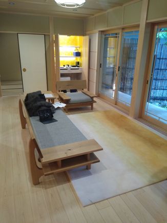 Living room with "mini bar" and garden view to the right.