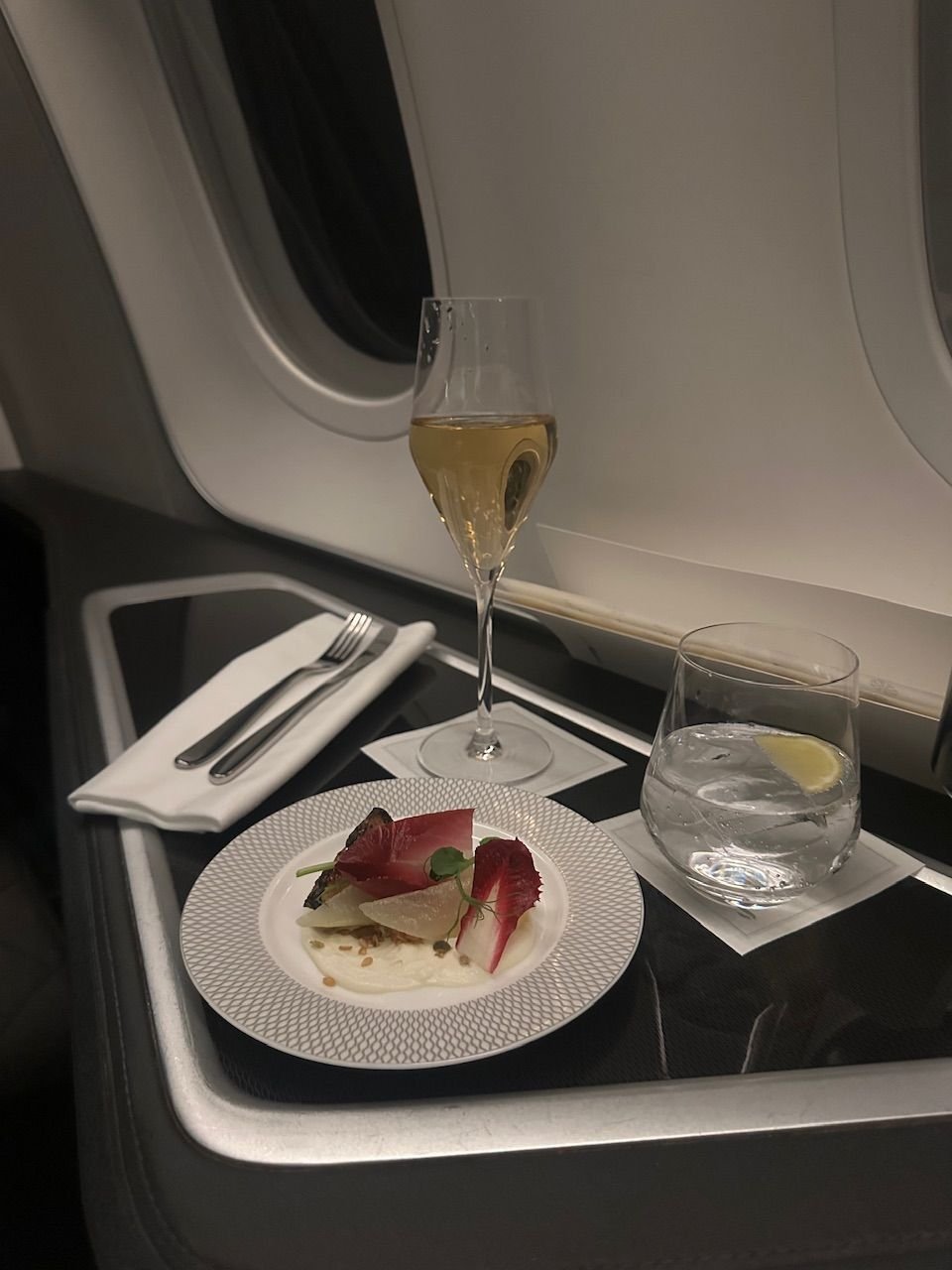 I had the amuse bouche after takeoff, however held off on dinner until ~2 hours after wheels up. 
