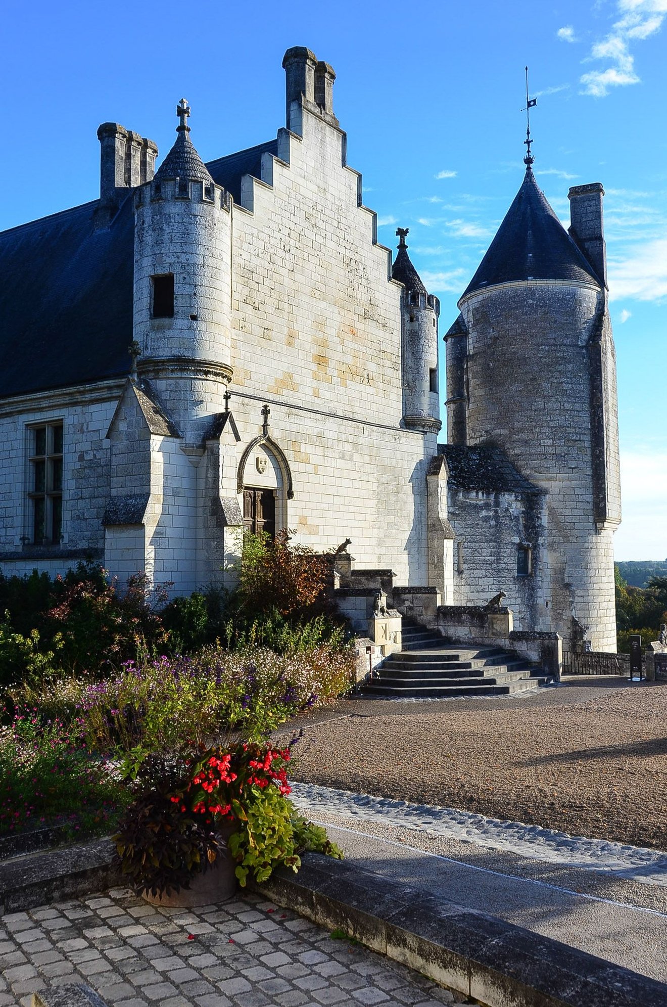 The lane shown in the previous picture is part of the absolutely essential Medieval City, an upper area that is the highlight of any Loches visit. So calm. So interesting. So tastefully preserved. A tiny community still resides up there. Shown here is the Loches Chateau, best appreciated from the outside with an art brush or camera or sketchpad or musical device in hand. Dog enthusiasts will find historic stone canine sculpture on its periphery.