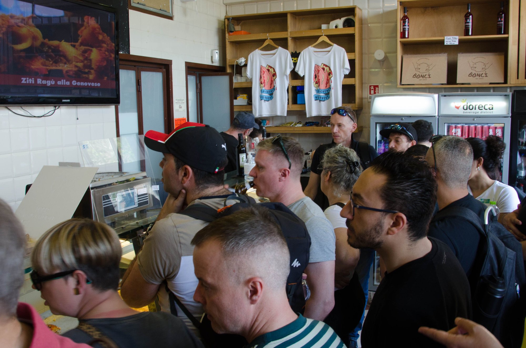 Roman throng at popular Pizzarium shop. Locals and tourists alike are attracted by the sheer variety of inventive flavors. One takes a number and waits. And waits. By design, we rented close by their smaller and FAR less crowded alternate bakery in Prati. But we wanted one experience of visiting their main shop shown above.