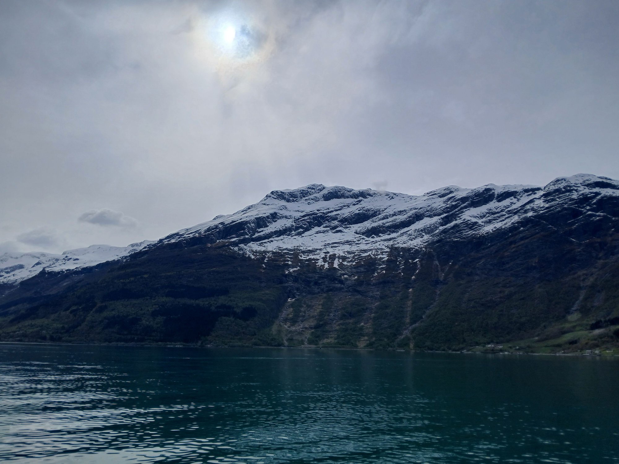 Views on our return sailing, with intermittent spells of bright sunshine and overcast skies with a drizzle